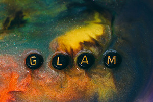 Glam word paint spill glitter letter, a Background Photo by Photo Drive Studio