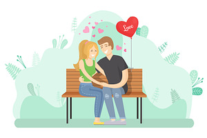 Couple In Love Hugging On The Bench