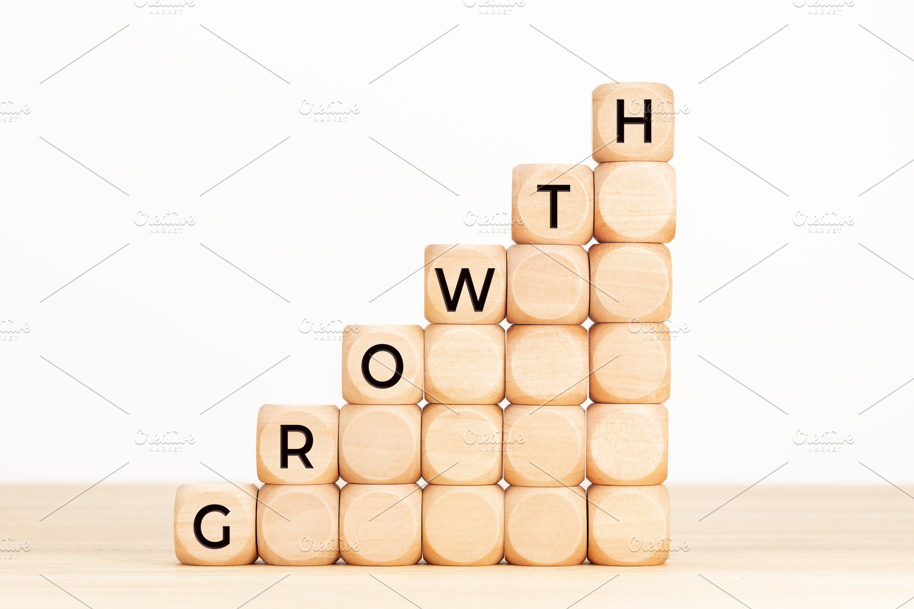 Growth concept. Text in wooden dices, a Business Photo by Formatoriginal photo