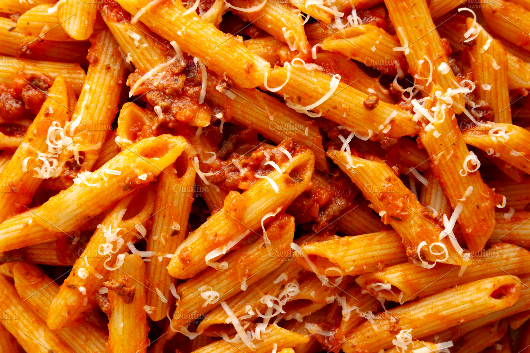 Homemade Pasta Bolognese with Cheese, top view., a Food & Drink Photo by LiudmylaChuhunova