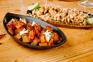 spanish patatas bravas and chipirones tapas, a Photo by Nito
