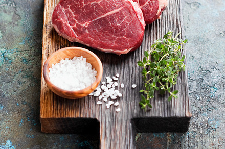 Raw fresh beef two steaks meat, sea