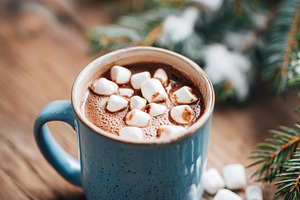 Cozy hot chocolate with marshmallows in winter setting, a Food & Drink Photo by AlyaAnd
