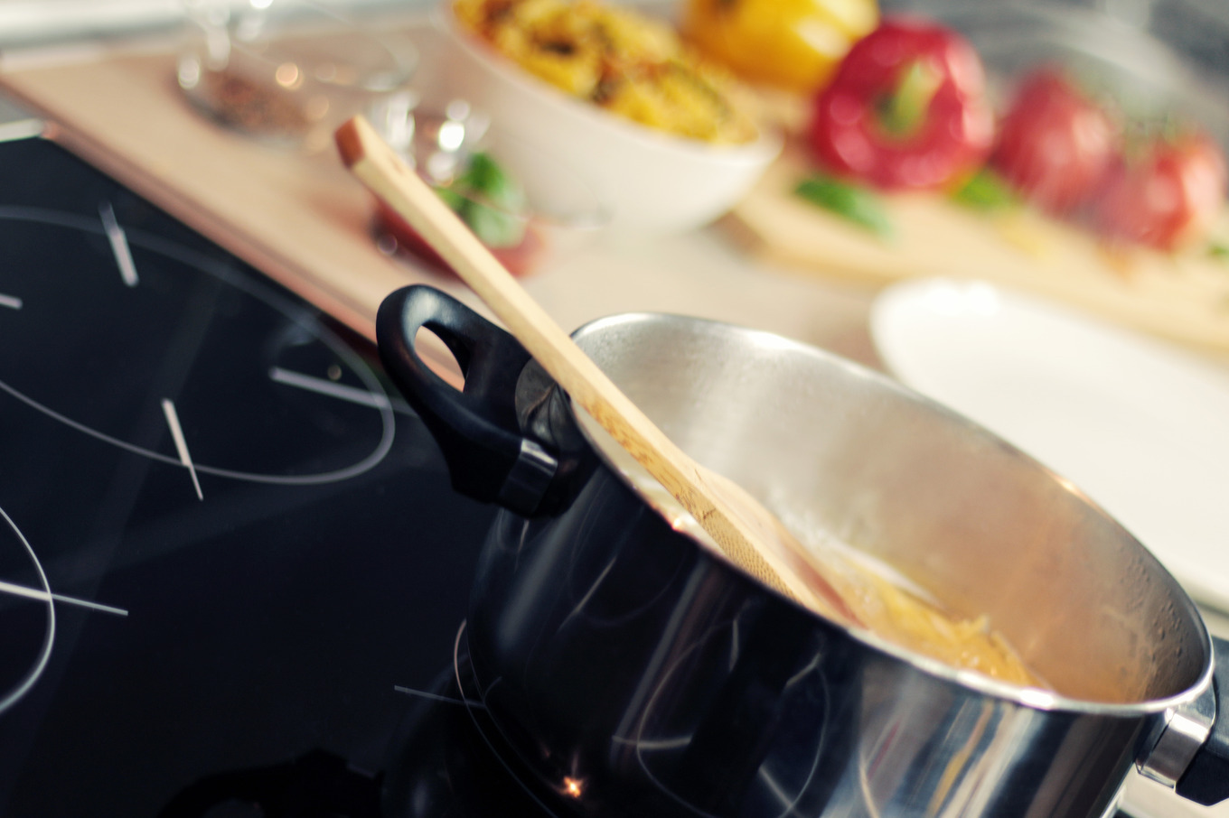 Cooking food in the kitchen, a Food & Drink Photo by StartMockups.com
