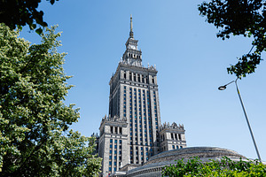 Historic building Congress Hall surrounded by trees and blue sky in a serene ur, a Photo by AS photostudio