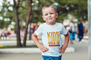 Kids T-Shirt Mock-Up Vol 4, a Shirt Mockup by Freeman Studio (Thumbnail 10 of 14)