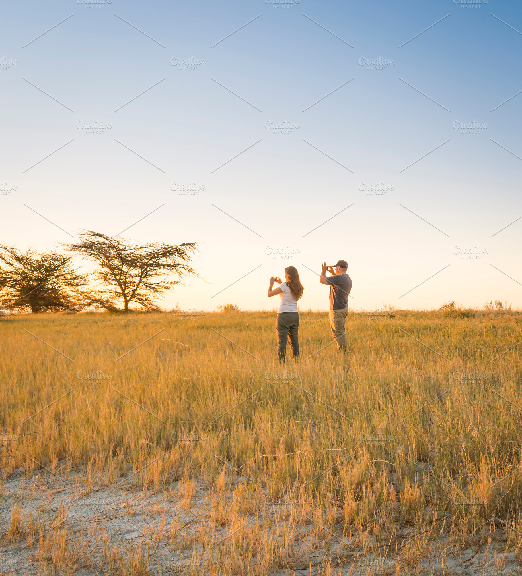 Tourists Taking Photos, a Person Photo by THP Creative