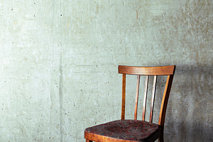 Vintage wooden chair concrete wall, an Architecture Photo by Edalin's Store