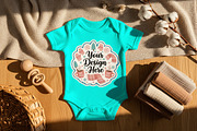 baby outfit mockup, a Hoody Mockup by Rami's Mockups (Thumbnail 1 of 3)