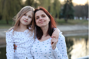 A brunette mother with her 9-year, a Person Photo by Nenahliadava Design