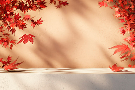 Autumn background scene with red maple leaves on table with sunl