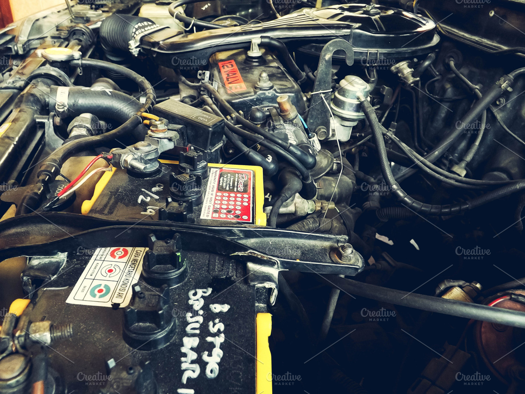 Car Machine Repair, an Industrial Photo by alyaphotoworks