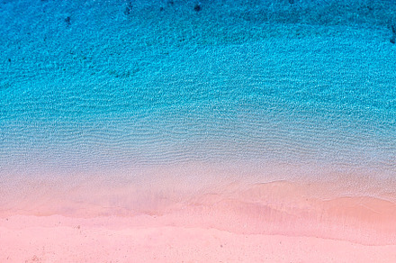 Pink beach and ocean as a background, a Nature Photo by Landscape and travel