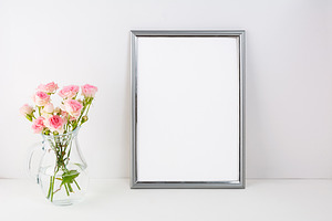 Silver frame mockup with pink roses, a Print Template by TasiPas
