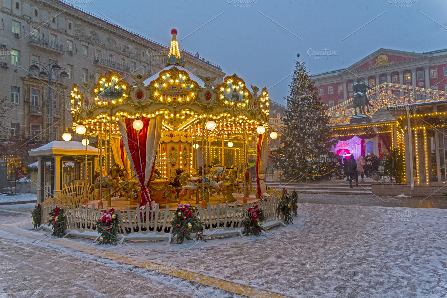 Children's carousel containing carousel, roundabout, and merry-go-round, a Holiday Photo by possum