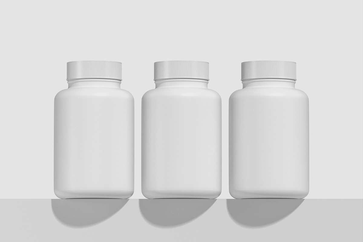 Vitamin Pill Bottle Mockup, a Packaging Mockup by Unerispace (Photo 3 of 5)
