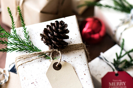 Christmas concept featuring baubales, box, and card