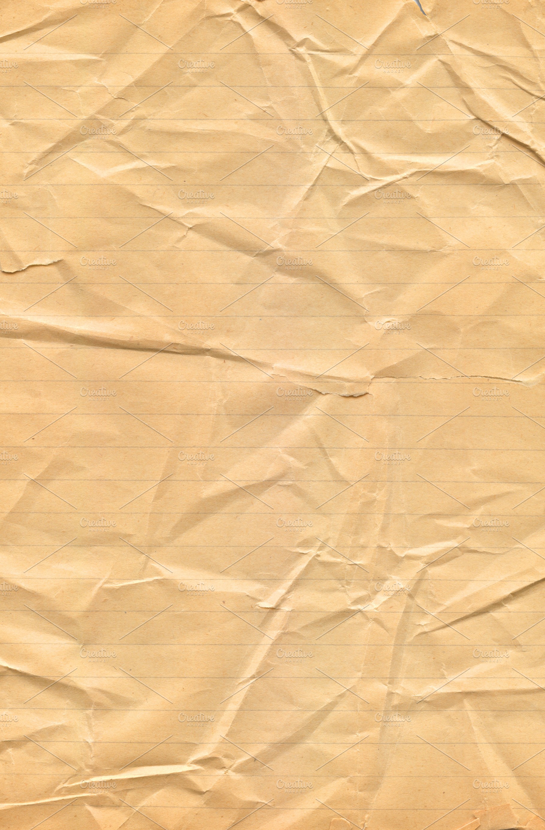 Crumpled brown lined paper texture, a Background Photo by GoodGoods