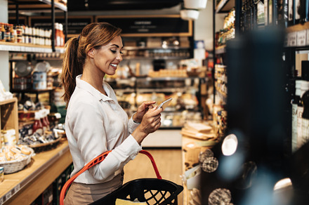 Young woman at grocery store, a Person Photo by REDDOT Studio