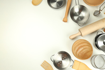 Different kitchen utensil on white background, top view, a Food & Drink Photo by AtlasStudio PRO