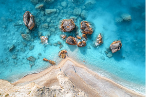 Aerial view of blue sea, rocks in, a Nature Photo by den-belitsky