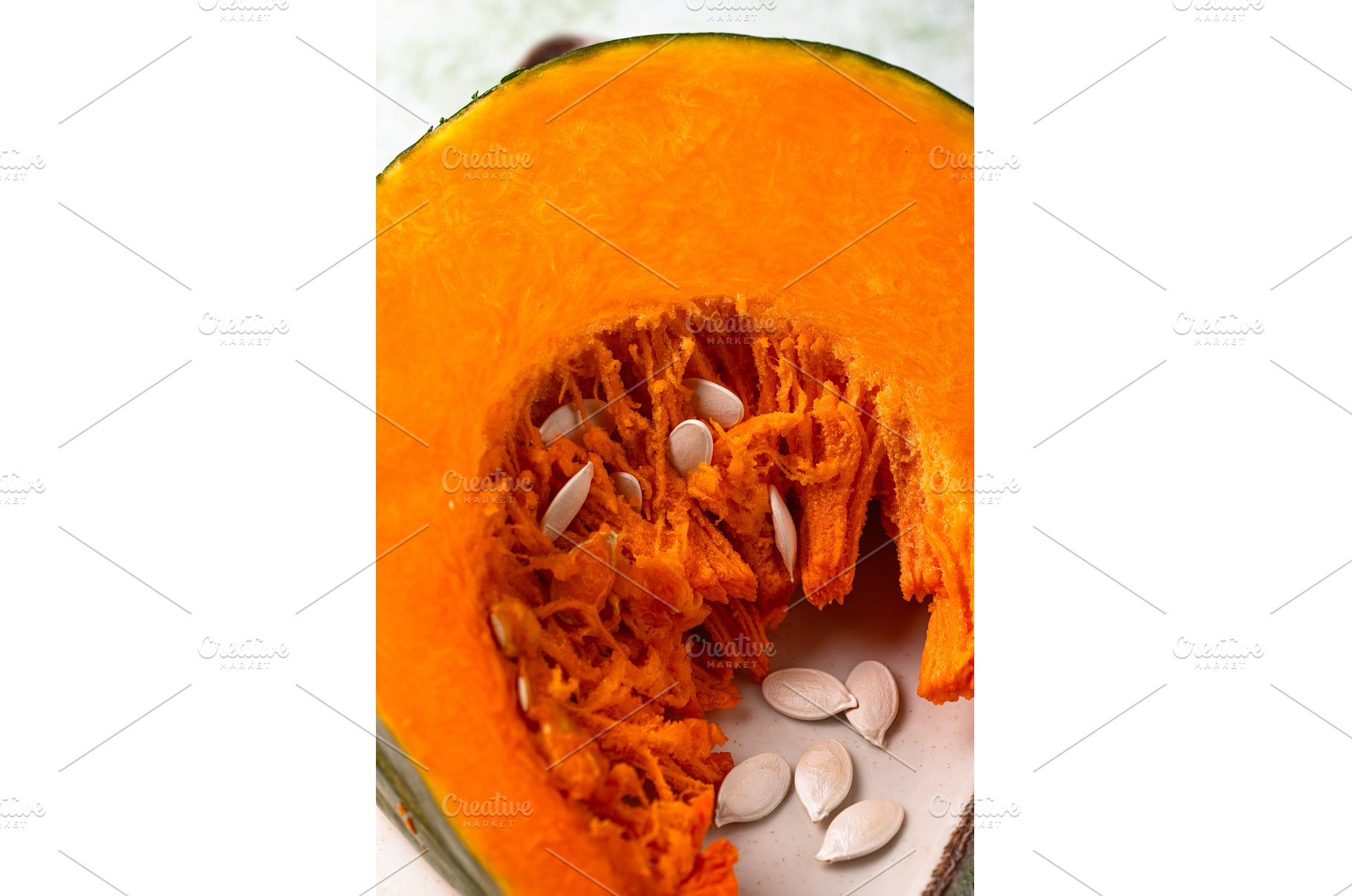 Raw sliced pumpkin with seed, a Food & Drink Photo by Yulia Furman