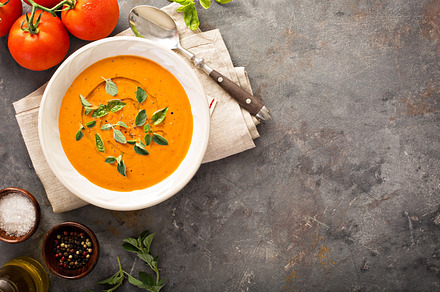 Tomato soup with olive oil and herbs containing tomato, soup, and olive, a Food & Drink Photo by farwasser