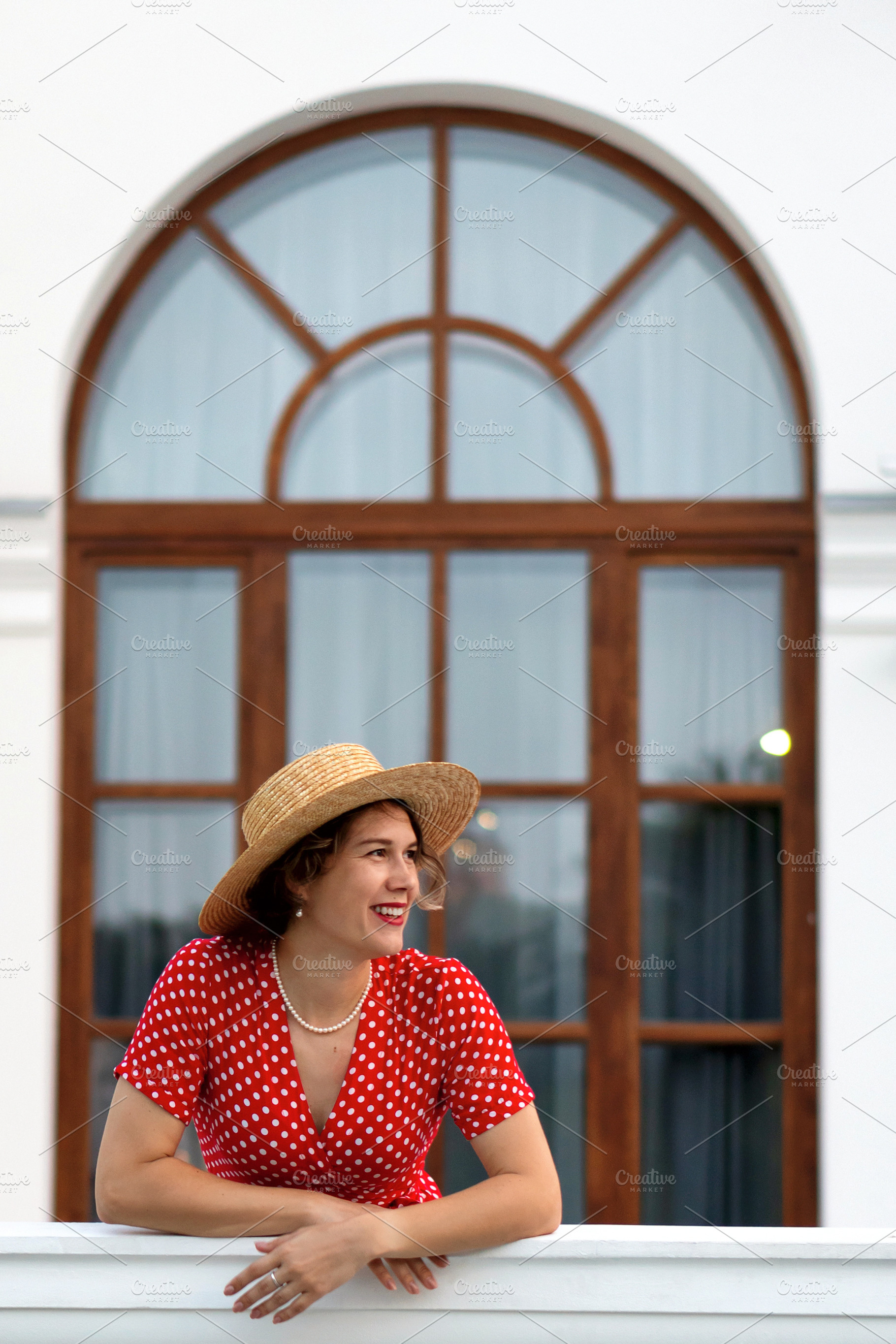 Smiling woman in red dress and hat, a Person Photo by Elena Vagengeim