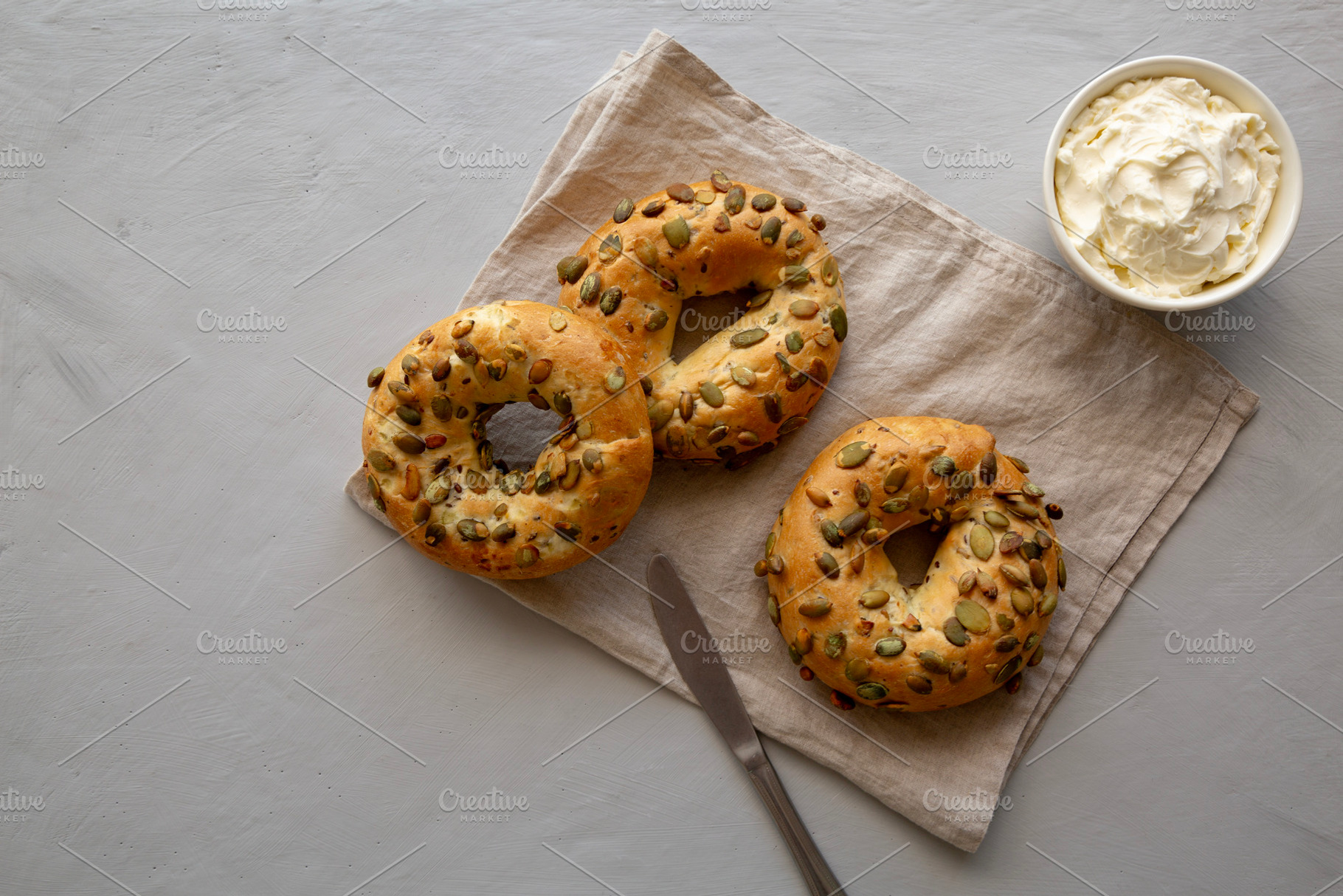 Homemade Pumpkin Seed Bagels for Breakfast Ready to Eat, a Food & Drink Photo by LiudmylaChuhunova