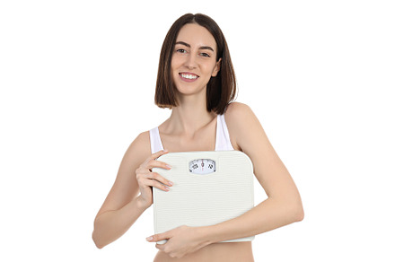Concept of weight loss, young woman isolated on white background, a Person Photo by AtlasStudio PRO