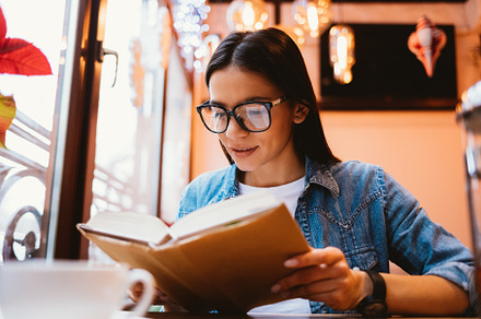 Happy young brunette woman wearing casual outfit and glasses, a Person Photo by progressman