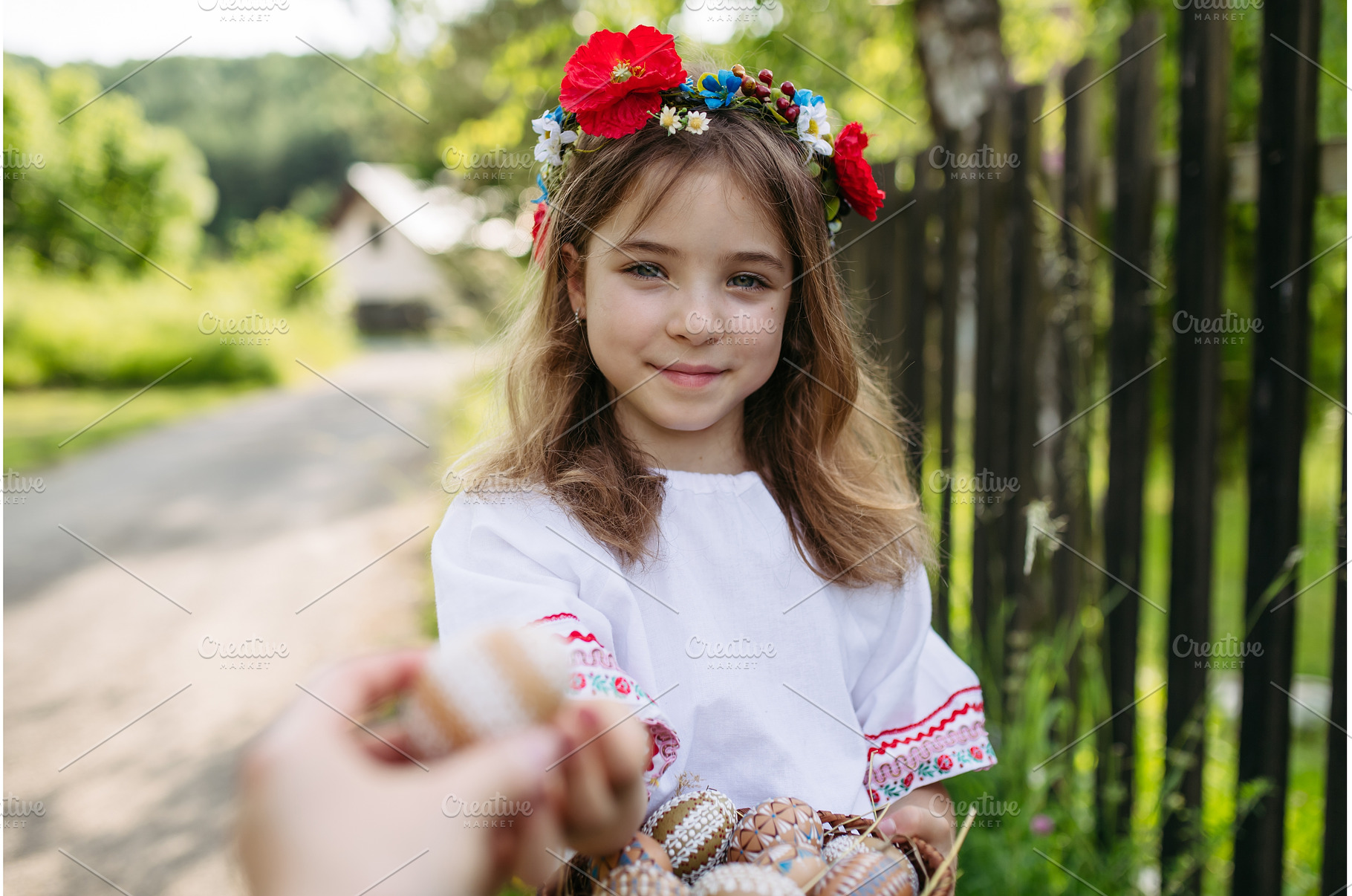 Young girl holding traditionally, a Holiday Photo by HalfPoint