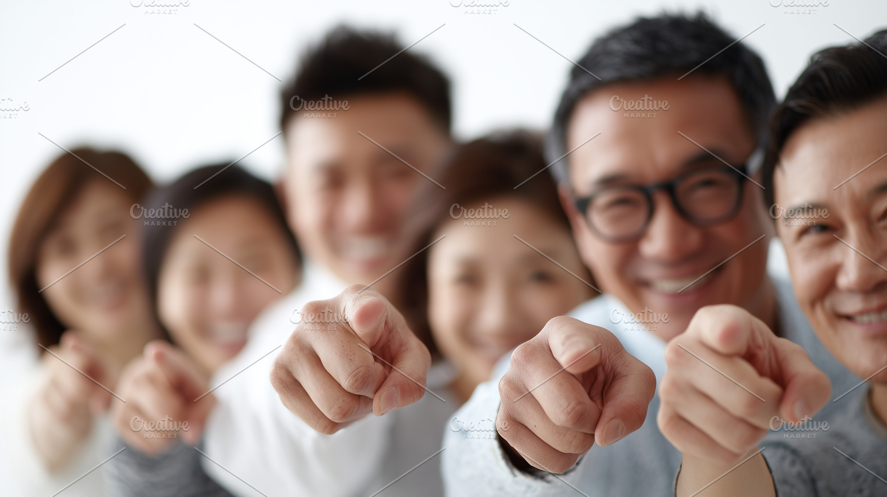 Group of smiling asian people point, a Business Photo by MistyDay