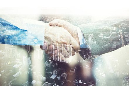 Double exposure of businessmen in suit handshaking agreed upon partnership, a Business Photo by Twinster Photo