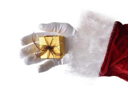 Santa Claus hand with gift white isolated, a Holiday Photo by Davizro's Market