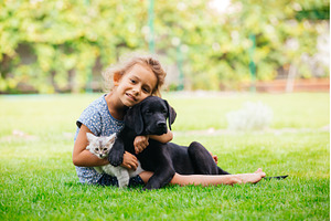 Pets giving their love to small