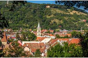 View of Sighisoara town in Romania, an Architecture Photo by Leonid Andronov