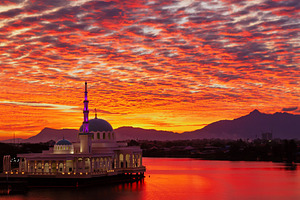Scenic view of mosque on river containing kuching, sarawak, and malaysia