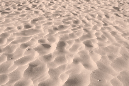 Beach sand, a Photo by Peopleimages.com