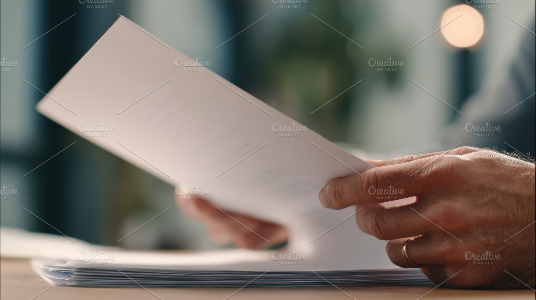 Office worker reading docs, a Photo by Beautiful things