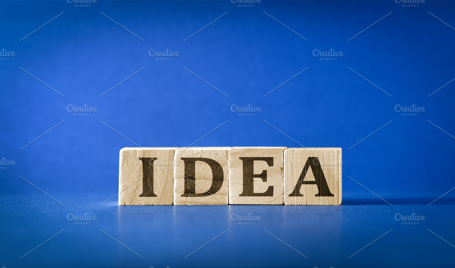 Idea Concept with Wooden Letter Blocks, a Business Photo by Davizro's Market