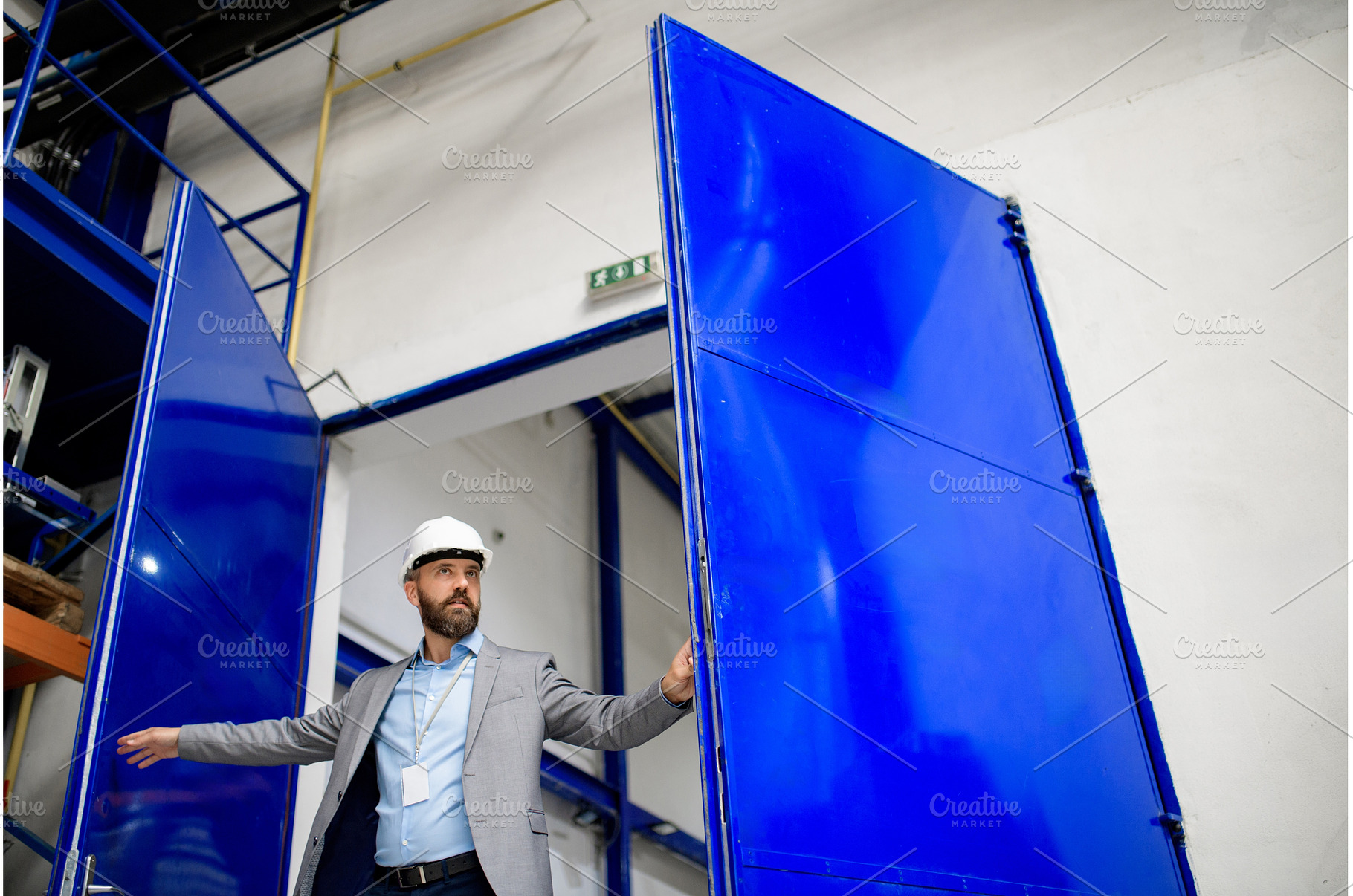 Senior industrial manager in modern, an Industrial Photo by HalfPoint