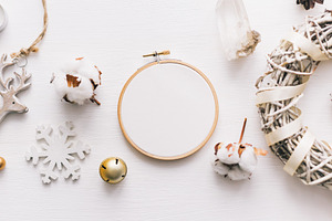 Flat lay top view christmas photo with an embroidery hoop and cute decoration