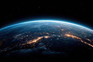 Earth at night with illuminated coastlines, a Technology Photo by AlyaAnd
