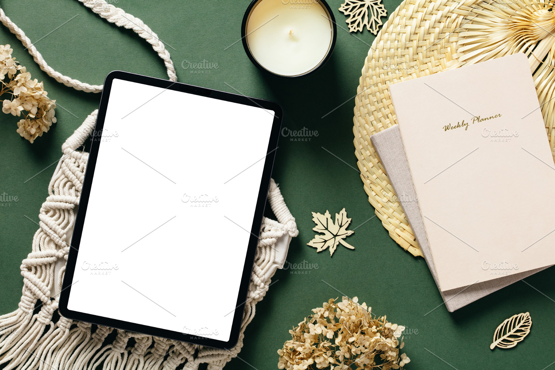 Feminine workspace with digital tablet pad mockup, paper notebook, candle, macr, a Beauty & Fashion Photo by photoguns