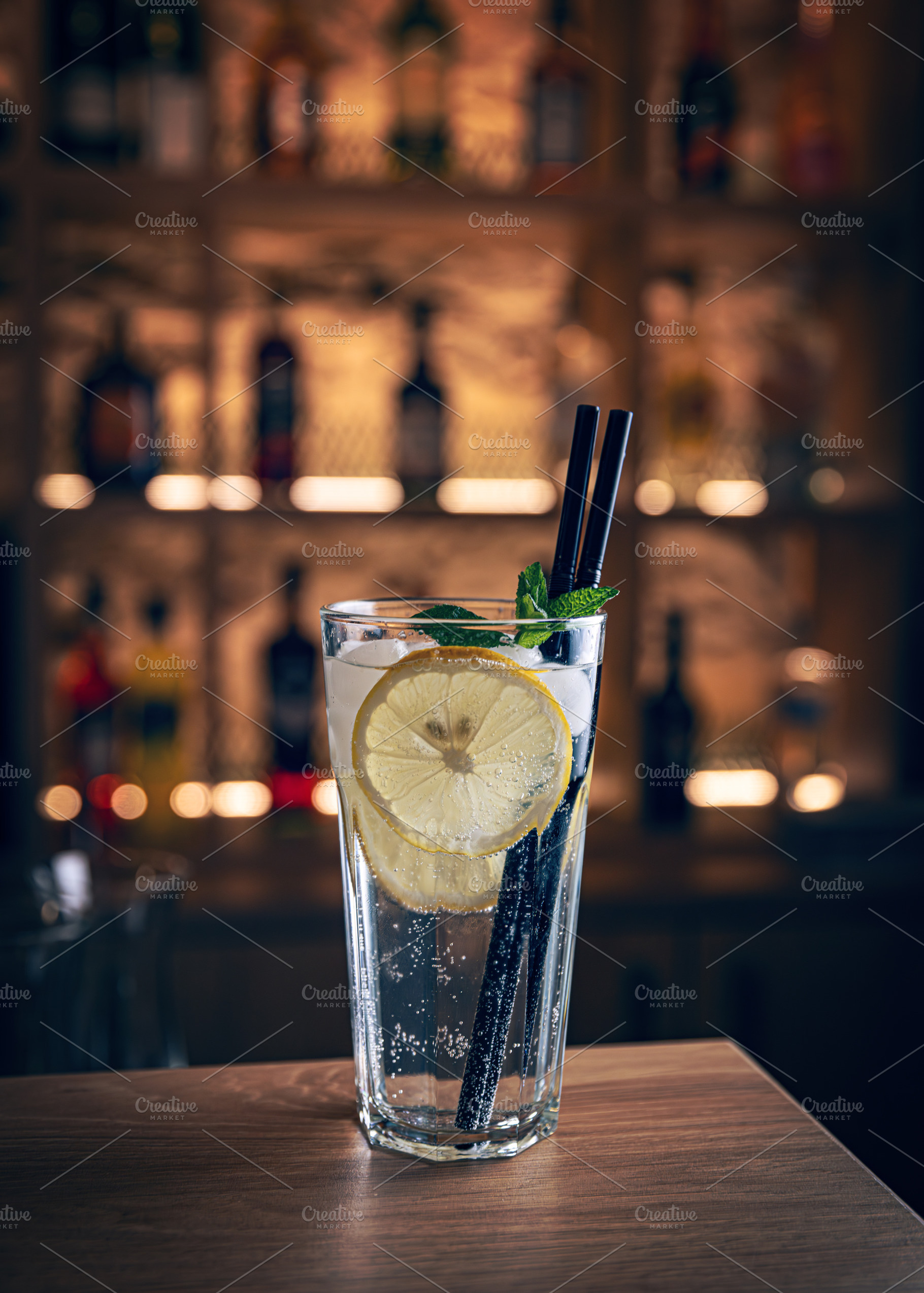 Refreshing cocktail with lemon and mint, a Photo by Grafvision photography