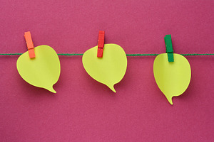 Three yellow thought cloud-shaped sticky notes attached to a rop, a Business Photo by ndanko