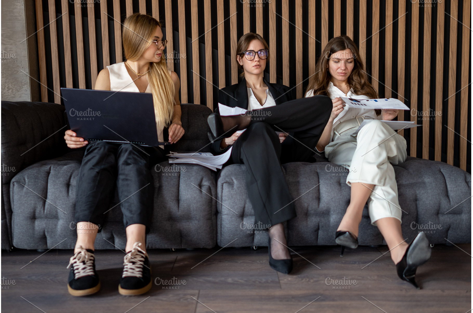 Businesswomen reviewing project data, a Business Photo by undrey