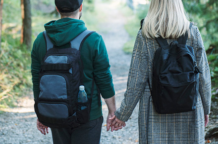 Traveler couple in love enjoying in the forest. Freedom and acti, a Person Photo by Olena Rudo
