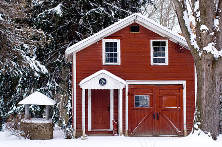 Red Rustic Cabin In Winter